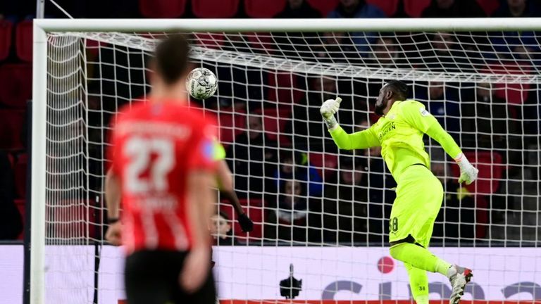 PSV goalkeeper Yvon Mvogo misses the ball and Jesper Karlsson will score the 2-1 during the Dutch Eredivisie match between PSV and AZ at Phillips stadium on February 5, 2022 in Eindhoven, Netherlands. ANP OLAF KRAAK (Photo by ANP via Getty Images)