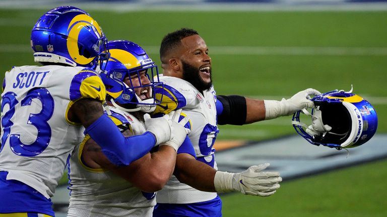 Los Angeles Rams defensive end Aaron Donald celebrates with teammates after the NFL Super Bowl 56 football game against the Cincinnati Bengals