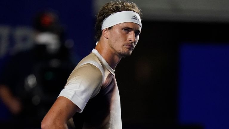 Alexander Zverev of Germany reacts during a match against to Jenson Brooksby of the U.S. at the Mexican Open tennis tournament in Acapulco, Mexico, Tuesday, Feb. 22, 2022. (AP Photo/Eduardo Verdugo)