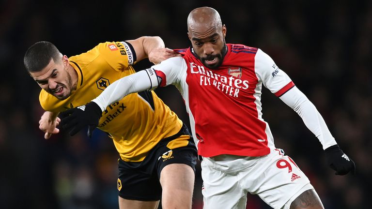 Arsenal's Alexandre Lacazette and Wolves' Conor Coady