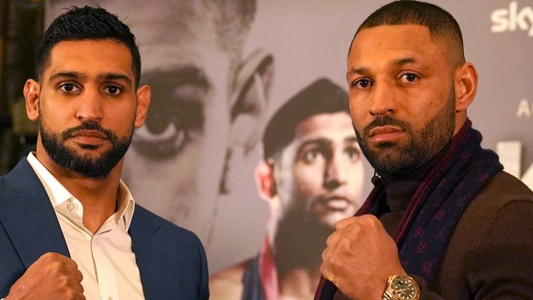 Amir Khan (left) and Kell Brook pose for photographs during a press conference at the London Hilton, London.  Domestic rivals Amir Khan and Kell Brook will finally settle their long-running grudge on February 19. Picture date: Monday November 29, 2021.