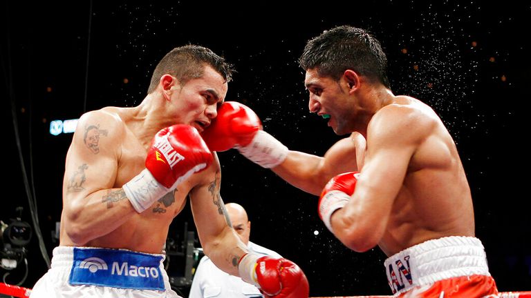 Amir Khan of England, right, punches Marcos Maidana of Argentina in the fourth round of their WBA Super Lightweight Championship boxing match Saturday December 11, 2010 in Las Vegas.  (AP Photo/Isaac Brekken)