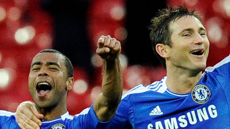 Chelsea&#39;s Frank Lampard, center, and team mate Ashley Cole celebrate after beating Tottenham Hotspur in their English FA Cup semifinal soccer match at Wembley Stadium in London, Sunday, April 15, 2012. (AP Photo/Tom Hevezi)
