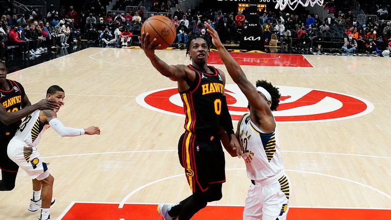 Atlanta Hawks guard Delon Wright goes up for a shot as Indiana Pacers guard Terry Taylor defends
