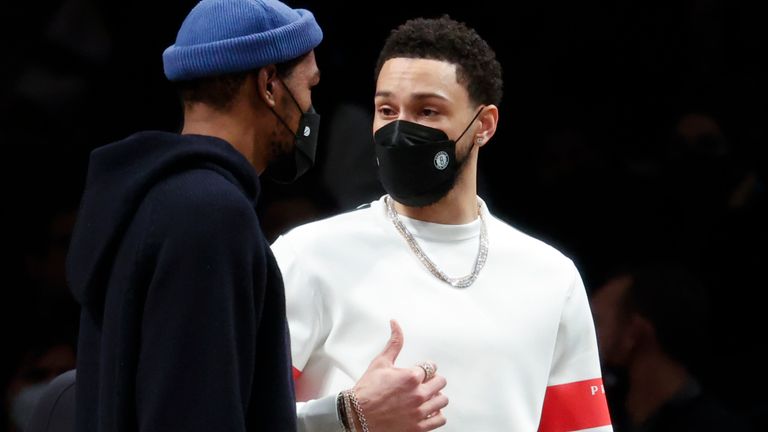Brooklyn Nets&#39; new star Ben Simmons, right, speaks with Kevin Durant