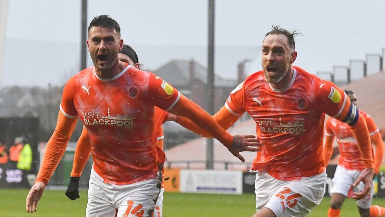 BLACKPOOL, ENGLAND - FEBRUARY 05: Blackpool's Gary Madine celebrates scoring his team...s 2nd goal during the Sky Bet Championship match between Blackpool and Bristol City at Bloomfield Road on February 5, 2022 in Blackpool, England. (Photo by Dave Howarth - CameraSport via Getty Images)                                                                                                                          