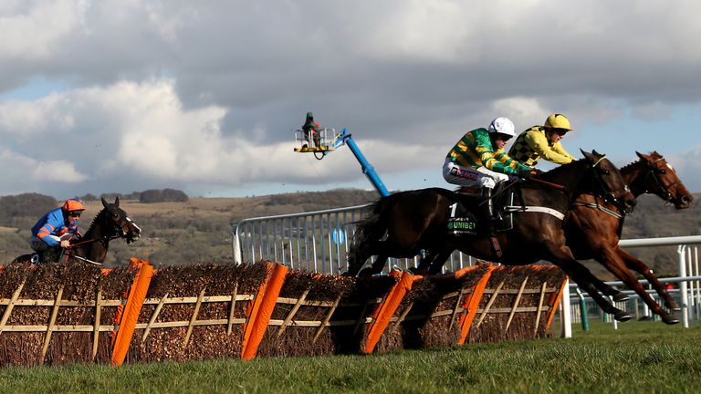 Buveur D'Air and Barry Geraghty see off the threat of Melon to land the Champion Hurdle.