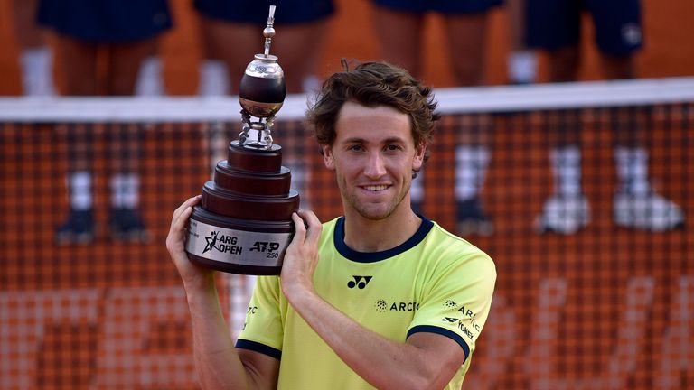 Casper Ruud of Norway holds the trophy after winning Argentina Open tennis singles final to Diego Schartzman, at Guillermo Vilas Stadium in Buenos Aires, Argentina, Sunday, Feb. 13, 2022. (AP Photo/Gustavo Garello)