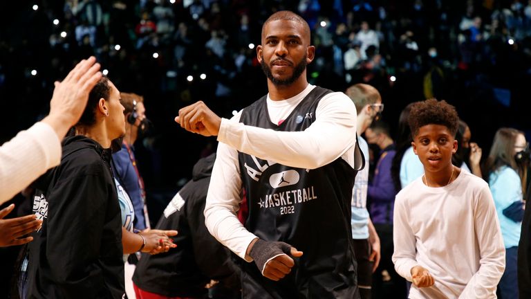 Chris Paul of Team LeBron walks onto the court during NBA All-Star Practice