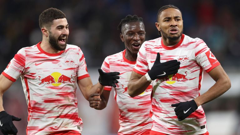 Leipzig&#39;s Christopher Nkunku celebrates after scoring against Cologne