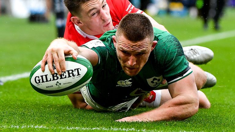 Wing Andrew Conway did brilliantly to reach out and score for Ireland' second try 