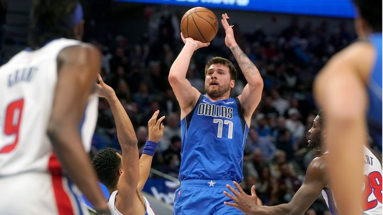 Dallas Mavericks guard Luka Doncic shoots against the Detroit Pistons during the first quarter of an NBA basketball game in Dallas