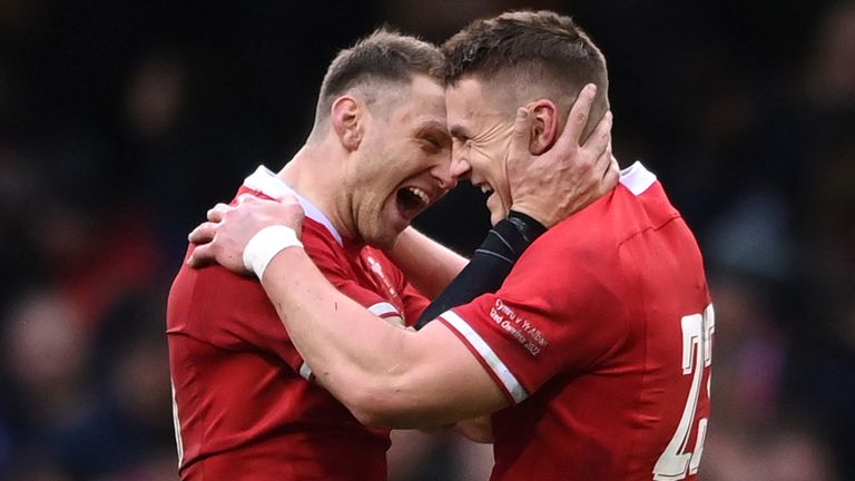 CARDIFF, WALES - FEBRUARY 12: Wales players Dan Biggar (l) and Jonathan Davies celebrates at the end of the game, both players were making their 100th appearance during the Guinness Six Nations match between Wales and Scotland at Principality Stadium on February 12, 2022 in Cardiff, Wales. (Photo by Stu Forster/Getty Images)
