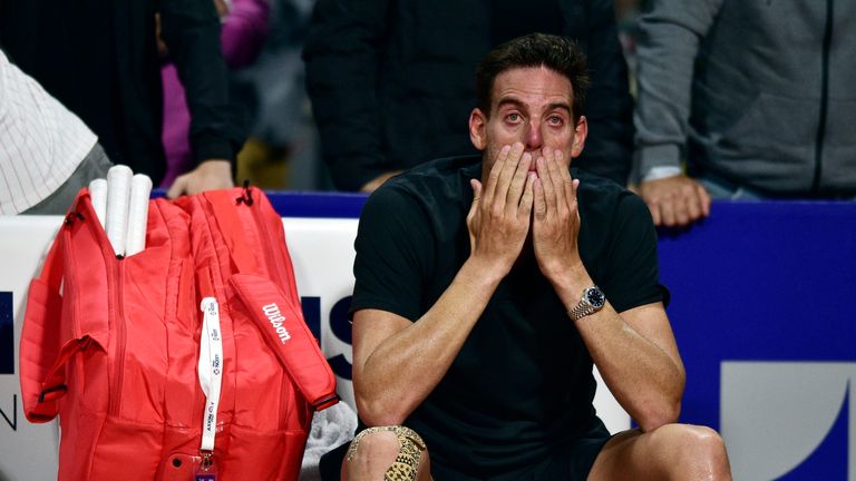 Juan Martin Del Potro cries after losing to Federico Delbonis 6-3, 6-1, at the end of an Argentina Open tennis match at Guillermo Vilas Stadium in Buenos Aires, Argentina Tuesday, Feb. 8, 2022.