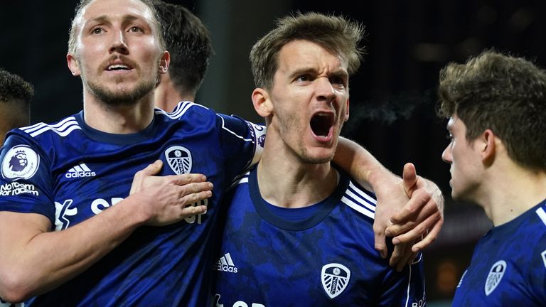 Leeds United's Diego Llorente (centre) celebrates with Luke Ayling after scoring their side's third goal of the game