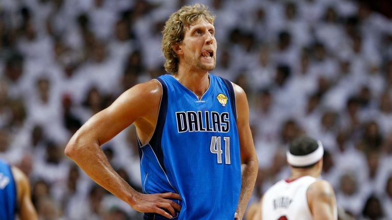 The Dallas Mavericks' Dirk Nowitzki reacts against the Miami Heat during Game 1 of the NBA Finals basketball game Tuesday, May 31, 2011, in Miami. (AP Photo/Lynne Sladky)