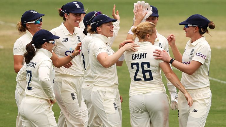 CANBERRA, AUSTRALIA - JANUARY 30: Katherine Brunt of England celebrates with her team after taking the wicket of Meg Lanning of Australia during day four of the Women&#39;s Test match in the Ashes series between Australia and England at Manuka Oval on January 30, 2022 in Canberra, Australia. (Photo by Mark Kolbe/Getty Images)