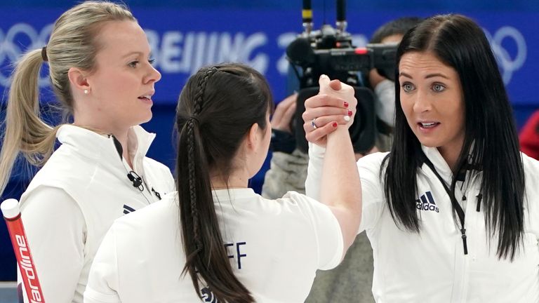 Eve Muirhead's GB curling team celebrate Sunday's win over Denmark (PA)