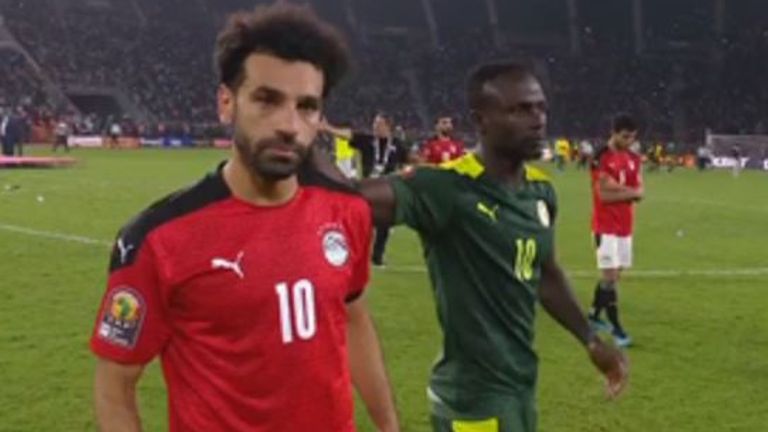 Sadio Mane consoles his Liverpool teammate Mo Salah after Senegal beat Egypt on penalties in the final of AFCON 2022.