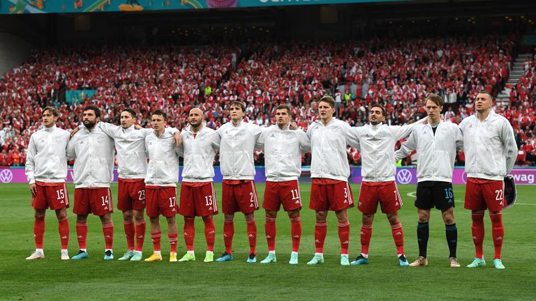Russian players sing the national anthem before the UEFA Euro 2020 Championship Group B match between Russia and Denmark at Parken Stadium on June 21, 2021 in Copenhagen, Denmark.