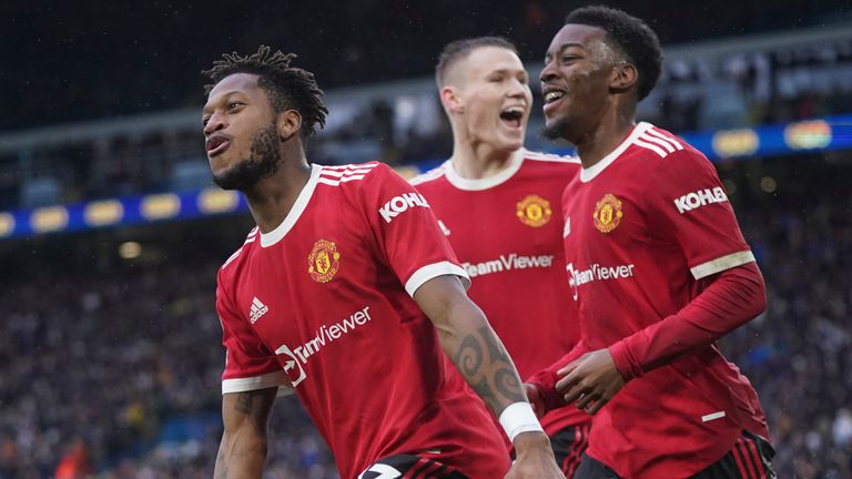 Manchester United&#39;s Fred, left, celebrates after scoring his side&#39;s third goal (AP)