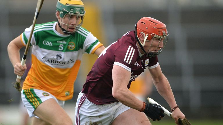 Conor Whelan of Galway in action against Jack Screeney of Offaly