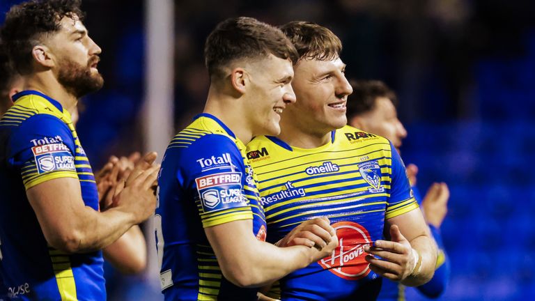 Picture by Alex Whitehead/SWpix.com - 17/02/2022 - Rugby League - Betfred Super League: Round 2 - Warrington Wolves vs Castleford Tigers - The Halliwell Jones Stadium, Warrington, England - Warrington’s George Williams and Josh Thewlis celebrate the win.