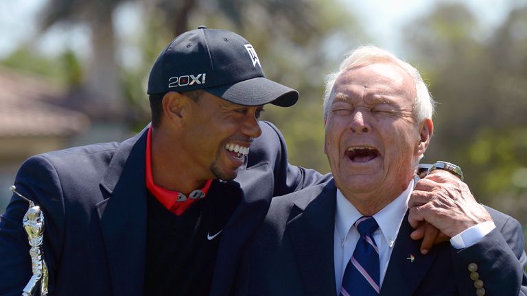 Tiger Woods and Arnold Palmer