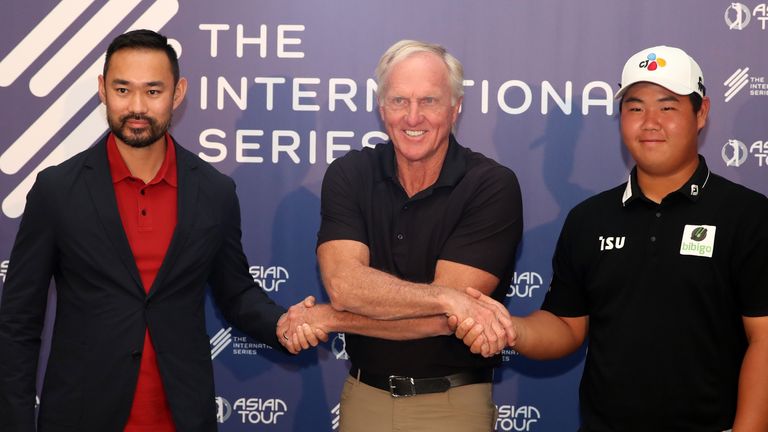 Cho Minn Thant, CEO and Commissioner of The Asian Tour, Greg Norman, CEO of Liv Golf Investments and Kim Joo-hyung of South Korea pose of a photo during a practice round prior to the PIF Saudi International at Royal Greens Golf & Country Club on February 01, 2022 in Al Murooj, Saudi Arabia. (Photo by Luke Walker/WME IMG/WME IMG via Getty Images)