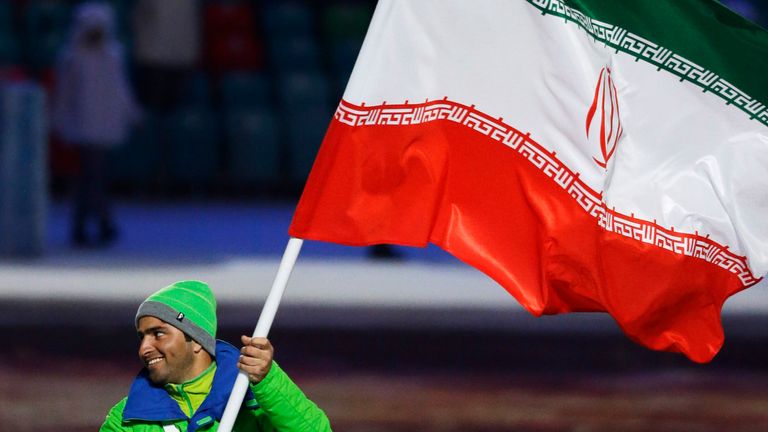 Hossein Saveh Shemshaki was Iran's flag-bearer at the 2014 Games in Sochi (AP)