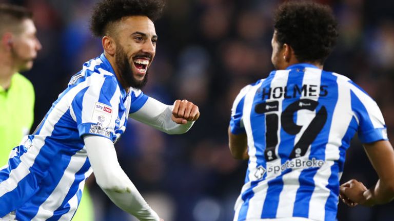  Duane Holmes of Huddersfield Town celebrates with Sorba Thomas of Huddersfield Town after scoring a goal to make it 1-0 during the Sky Bet Championship match between Huddersfield Town and Derby County at Kirklees Stadium on February 2, 2022 in Huddersfield