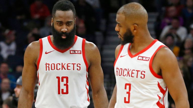 James Harden, left, and Chris Paul confer during a Houston Rockets game against the Minnesota Timberwolves in February 2019