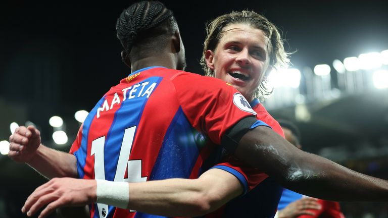 WATFORD, ENGLAND - FEBRUARY 23: Jean-Philippe Mateta celebrates with teammate Conor Gallagher of Crystal Palace after scoring their team's first goal during the Premier League match between Watford and Crystal Palace at Vicarage Road on February 23, 2022 in Watford, England. (Photo by Eddie Keogh/Getty Images)