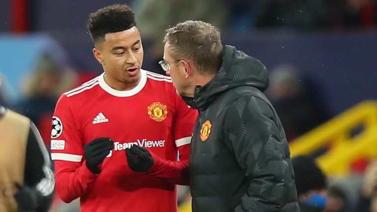 Jesse Lingard speaks with Ralf Rangnick during a Champions League match against Young Boys