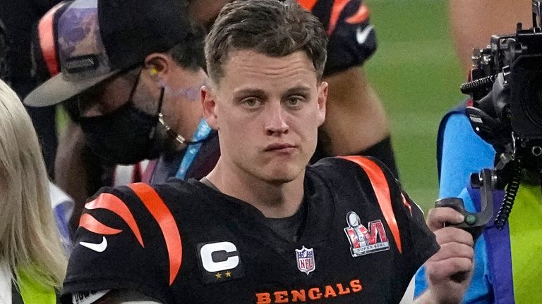 Cincinnati Bengals quarterback Joe Burrow (9) leaves the field after the NFL Super Bowl 56 football game against the Los Angeles Rams, Sunday, Feb. 13, 2022, in Inglewood, Calif. The Rams defeated the Bengals 23-30. (AP Photo/Elaine Thompson) 