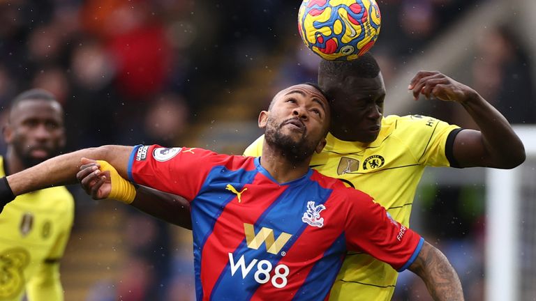 Jordan Ayew of Crystal Palace is challenged by Malang Sarr of Chelsea