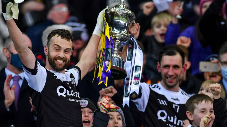 12 February 2022; Kilcoo joint-captains Conor Laverty, left, and Aidan Branagan lift the Andy Merrigan cup after the AIB GAA Football All-Ireland Senior Club Championship Final match between Kilcoo, Down, and Kilmacud Crokes, Dublin, at Croke Park in Dublin. Photo by Piaras .. M..dheach/Sportsfile