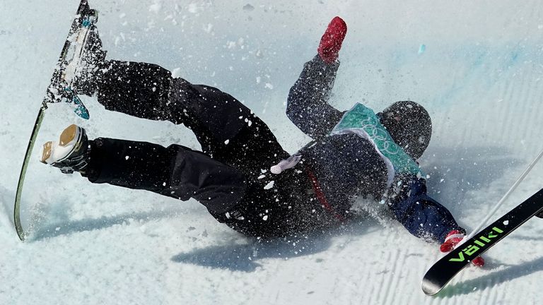 Kirsty Muir, of Britain, crashes as she lands during the women...s freestyle skiing big air finals of the 2022 Winter Olympics, Tuesday, Feb. 8, 2022, in Beijing. (AP Photo/Jae C. Hong)