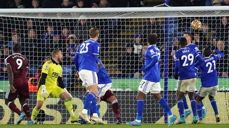 Leicester's plays fail to clear Craig Dawson's header at the end