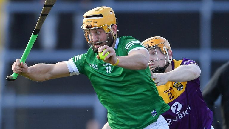 6 February 2022; Tom Morrissey of Limerick is tackled by Simon Donohoe of Wexford during the Allianz Hurling League Division 1 Group A match between Wexford and Limerick at Chadwicks Wexford Park in Wexford. Photo by Ray McManus/Sportsfile