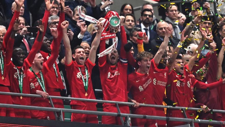 Jordan Henderson lifts the Carabao Cup with his Liverpool teammates