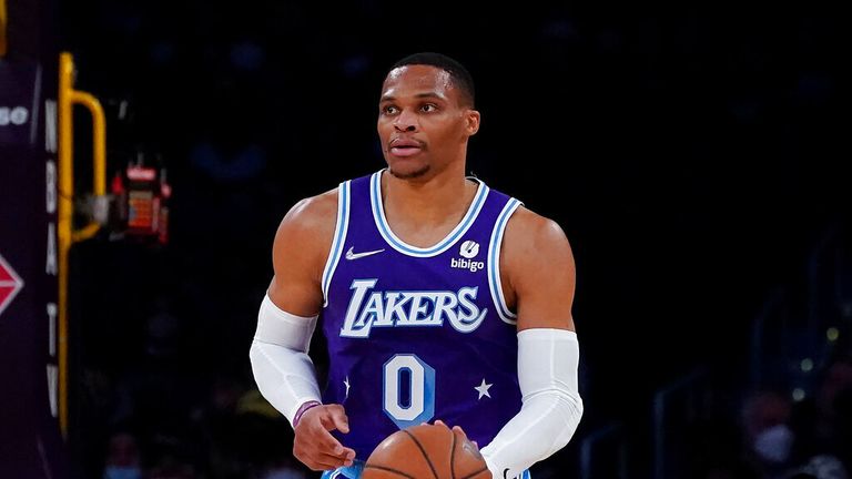 Los Angeles Lakers guard Russell Westbrook (0) controls the ball during an NBA basketball game against the Atlanta Hawks in Los Angeles, Friday, Jan. 7, 2022. (AP Photo/Ashley Landis)