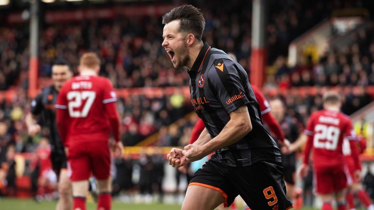 ABERDEEN, SCOTLAND - FEBRUARY 26: Marc McNulty celebrates scoring to make it 1-0 Dundee Utd during a Cinch Premiership match between Aberdeen and Dundee United at Pittodrie Stadium, on February 26, in Aberdeen, Scotland.  (Photo by Mark Scates / SNS Group)