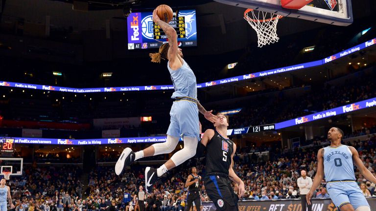 Memphis Grizzlies forward Brandon Clarke goes up for a dunk against Los Angeles Clippers guard Luke Kennard