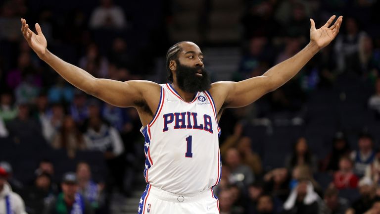 Philadelphia 76ers guard James Harden reacts after scoring a basket against the Minnesota Timberwolves during the second half of an NBA basketball game Friday, Feb. 25, 2022, in Minneapolis.