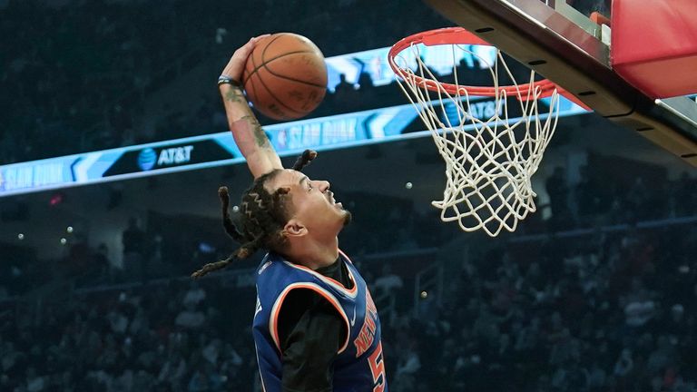Orlando Magics' Cole Anthony goes up for a slam during the dunk contest part of the skills challenge competition, part of NBA All-Star basketball game weekend, Saturday, Feb. 19, 2022, in Cleveland. 