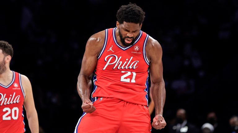 Philadelphia 76ers center Joel Embiid reacts after being fouled late in the second half of an NBA basketball game against the Brooklyn Nets on Thursday, Dec. 30, 2021, in New York. 76ers won 110-102.