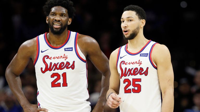 Philadelphia 76ers pair Joel Embiid and Ben Simmons in conversation on court during a 2019 clash with the New Orleans Pelicans