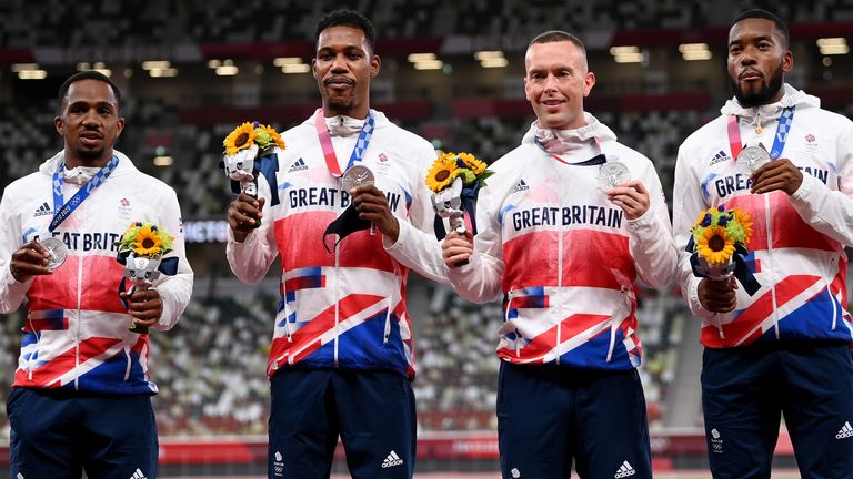  CJ Ujah, Zharnel Hughes, Richard Kilty and Nethaneel Mitchell-Blake of Team Great Britain stand on the podium during the medal ceremony for the Men's 4 x 100m Relay