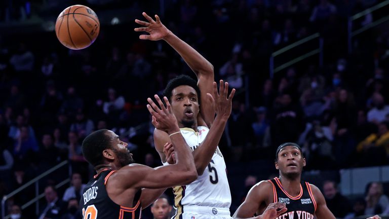 New Orleans Pelicans forward Herbert Jones (5) passes the ball over New York Knicks guard Alec Burks during the second half of an NBA